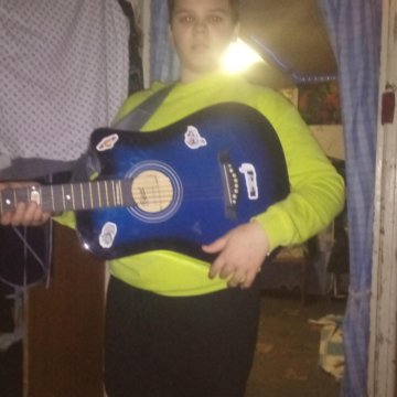 Акустическая гитара