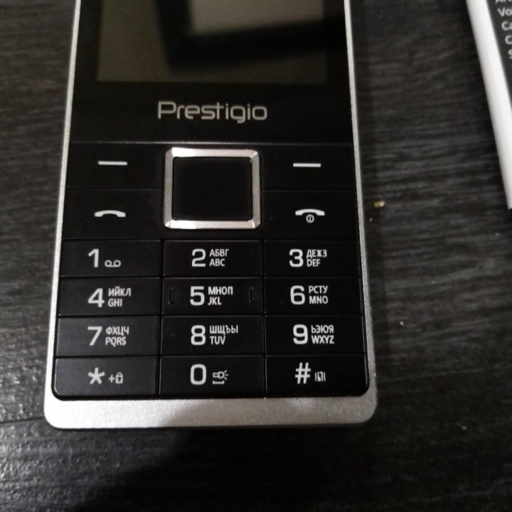 почти Новый сотовый телефон Prestigio Muze K1