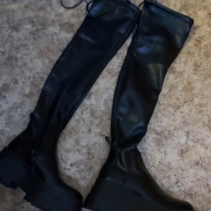 высокие ботфорты