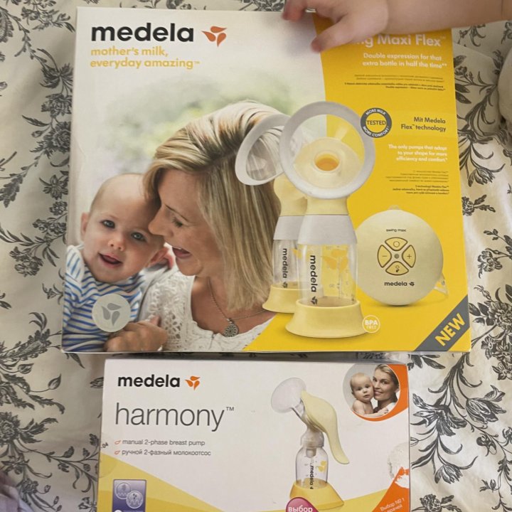 Молокоотсос Medela электрический и ручной