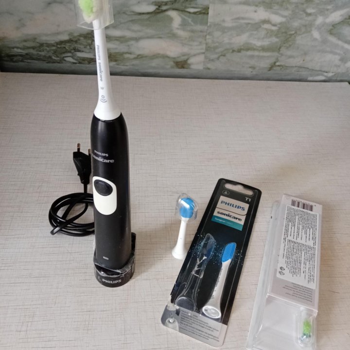 Электрическая зубная щетка Philips Sonicare HX6100