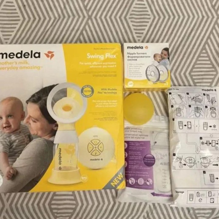 Молокоотсос medela swing flex