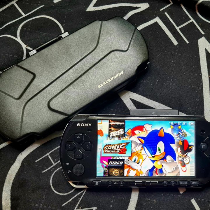 Sony PSP + много игр + кейс