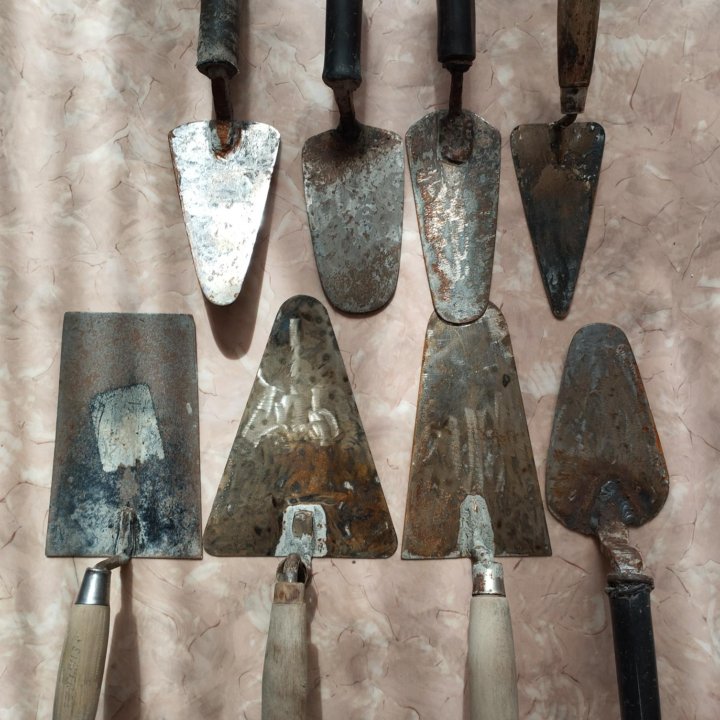 Мастерок кельма, шпатель.