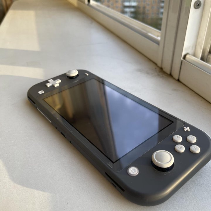 Nintendo Switch Lite (серая)