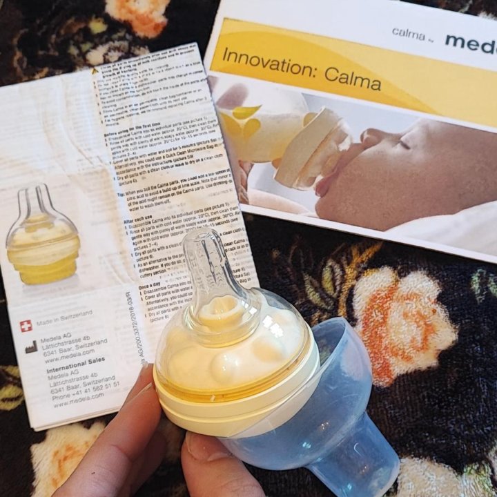 Молокоотсос Medela электрический