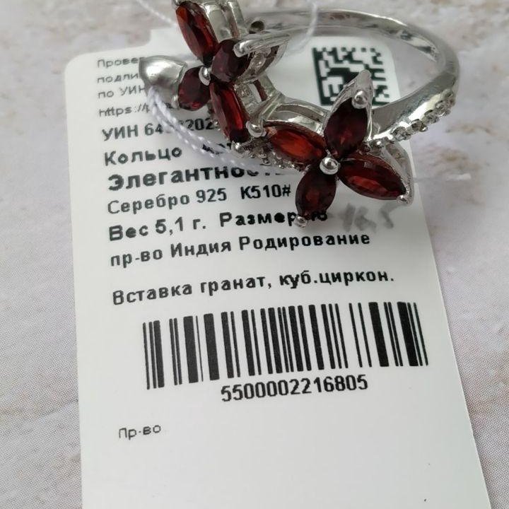 Серебряное кольцо с гранатами