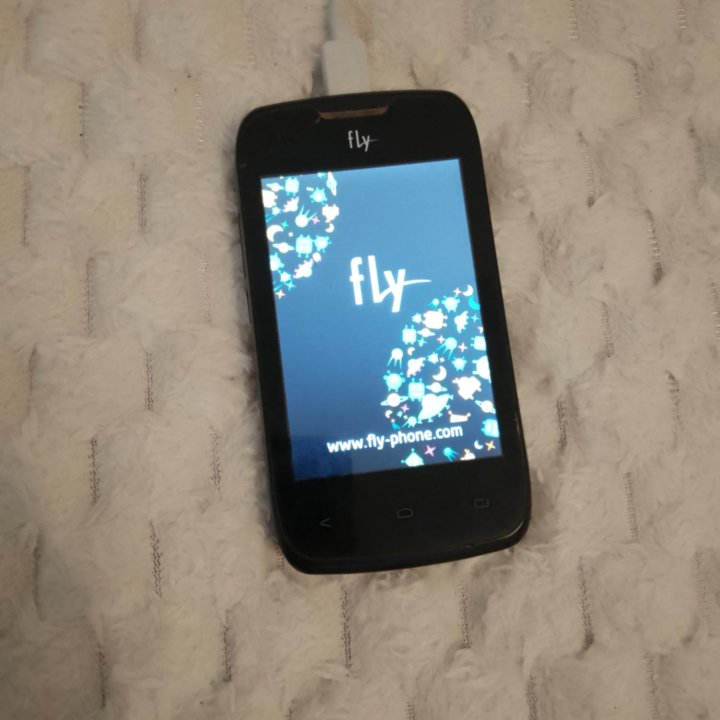 Телефон fly