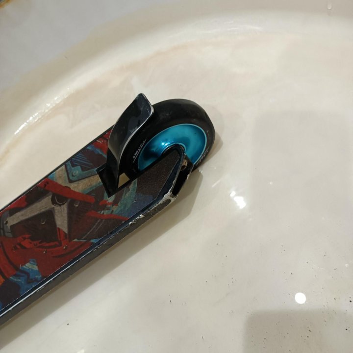 Трюковой самокат reaction