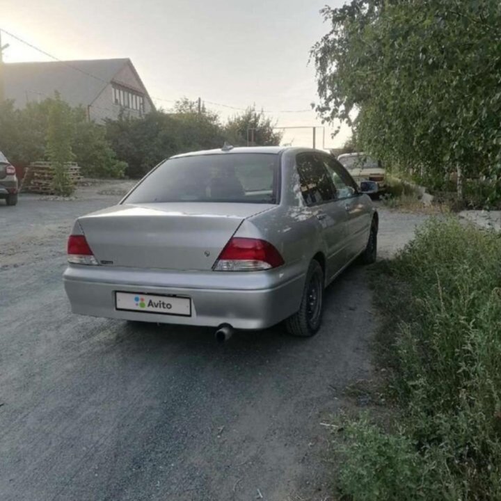 Mitsubishi Lancer, 2002