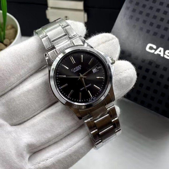 Часы Casio с круглым циферблатом