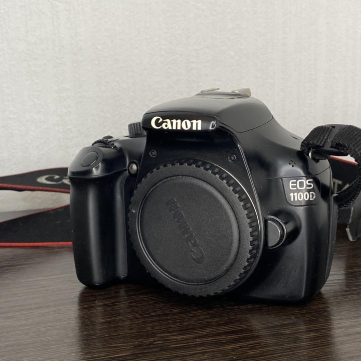 Canon 1100D Body + зарядное устройство.