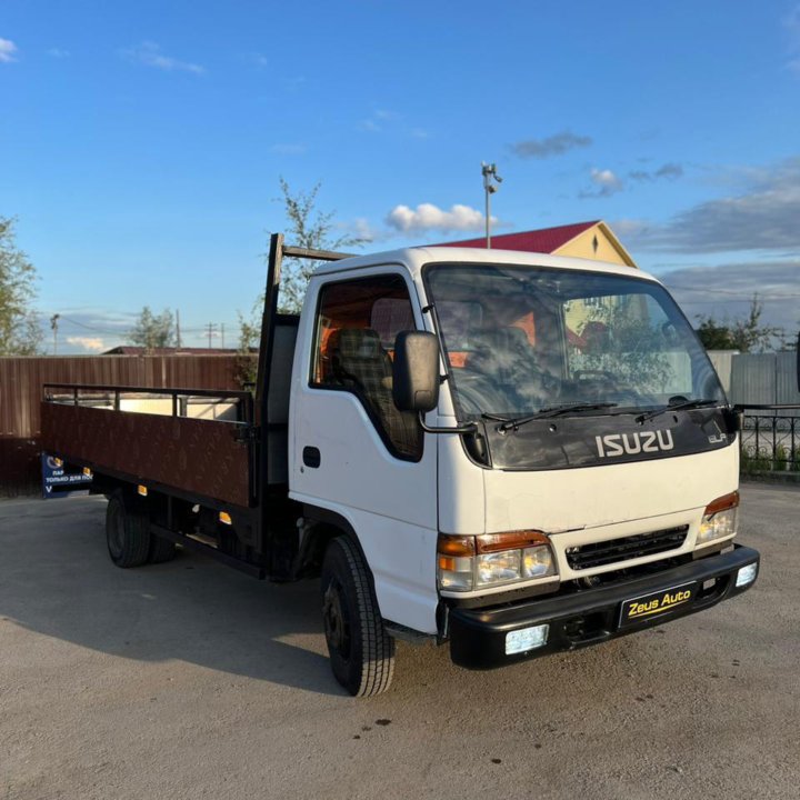 Isuzu Elf Бортовой грузовик