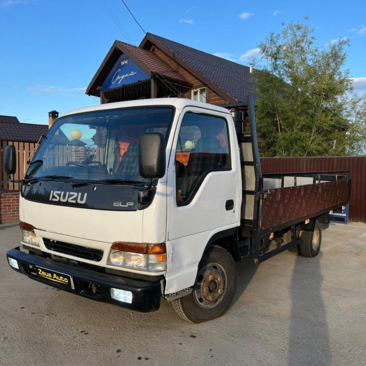 Isuzu Elf Бортовой грузовик