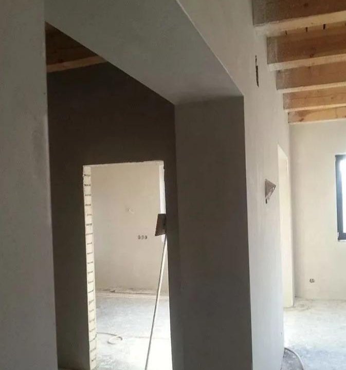 Штукатурка стен по маякам под обои