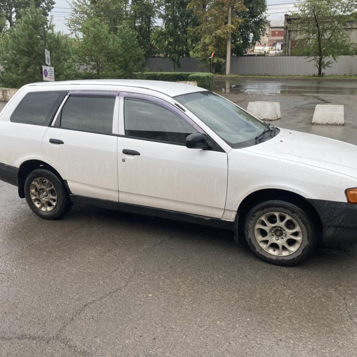 Mazda Familia, 2000