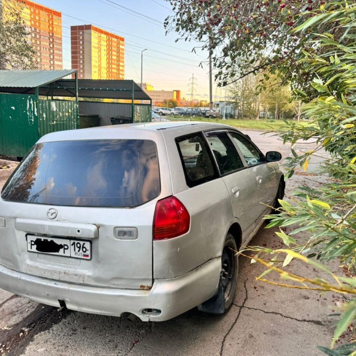 Mazda Familia, 2002